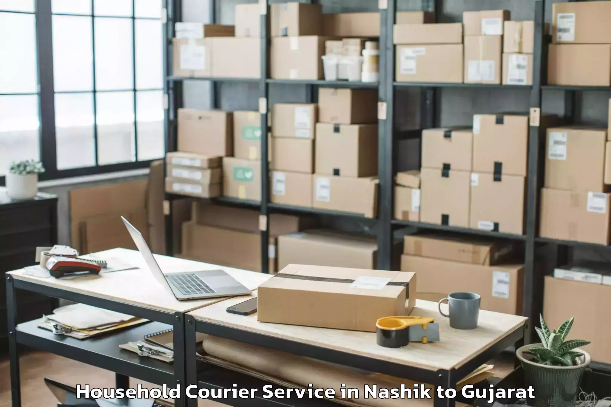 Reliable Nashik to Balasinor Household Courier